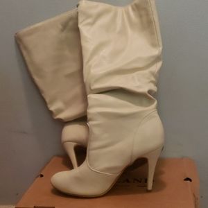 White knee high boots